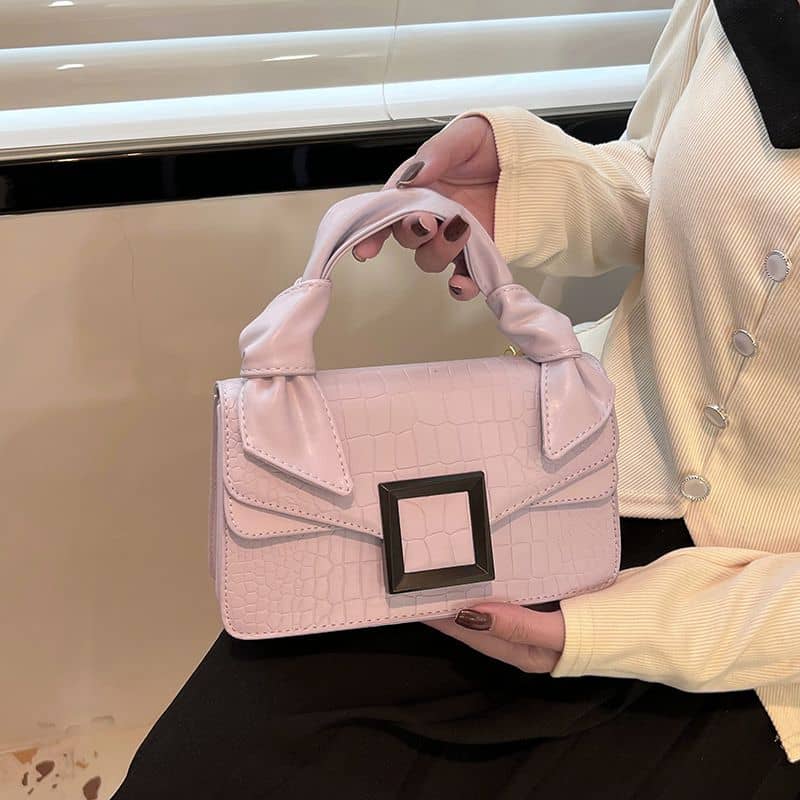 High-end handbag with trendy stone pattern